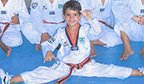 Mais jovem faixa preta de taekwondo